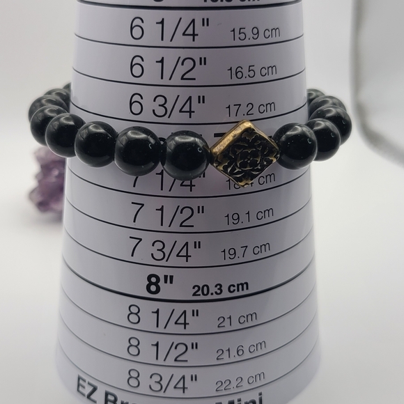 10mm green Goldstone bracelet with Tibetan style charms. - Picture 5 of 5